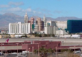 Las Vegas Airport shuttle bus service for rent to transport visitors from the Las Vegas Airport to Las Vegas Hotels